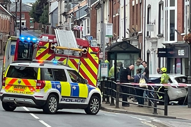 The accident scene in Crediton High Street.  AQ 1990