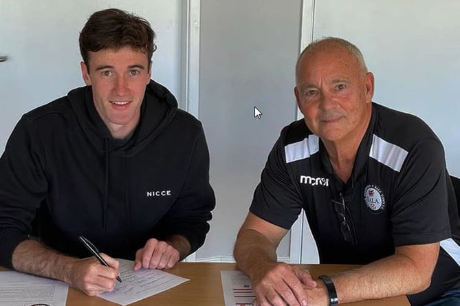 George Newell signs on the dotted line for Bala Town for the JD Cymru Premier 2022/23 season