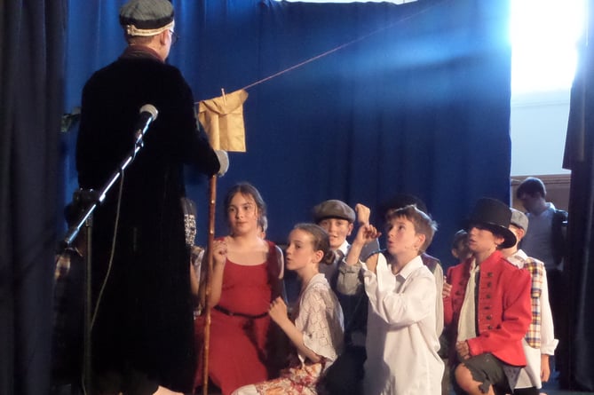 During a scene of Oliver! at Hayward’s Primary School.