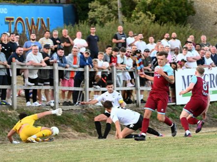 Action from Farnham Town’s 1-1 draw against Jersey Bulls