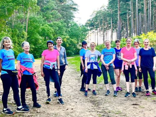 Beginners assemble in the Bourne Woods with coach Julie Tagg (on the left of the picture)