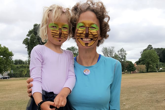 Face painting at Alton Climate Action Network’s Eco-Streets launch party on The Butts in Alton, July 23rd 2022.