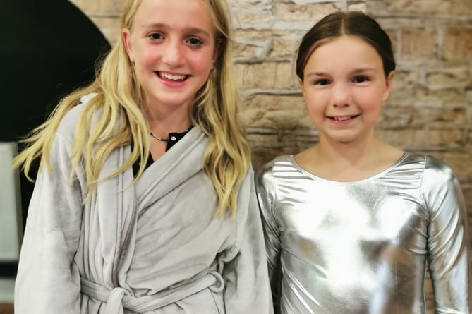 Two of the cast of Macbeth, Alton School’s Year 6 production, July 2022.