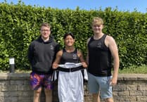 Three students complete charity triathlon charity in three legs