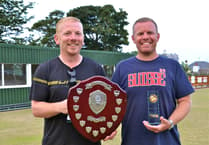 Withers and Dunn retain doubles championship
