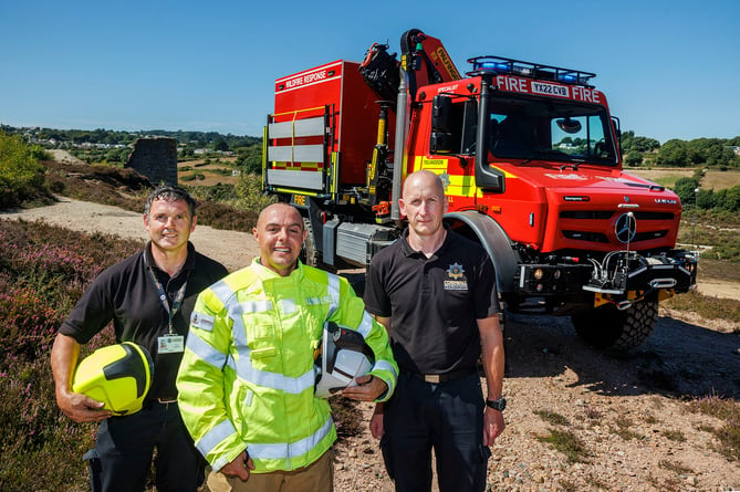 Cornwall Fire & Rescue Service colleagues, from left, Contracts Manager Adrian Stone, Watch Manager â Assets Ben Goddard, and Driver-trainer Phil James are pictured during training on the new Unimog