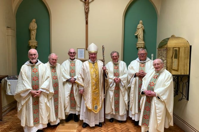 Bishop Philip Egan and Catholic priests at St John’s Cathedral.
